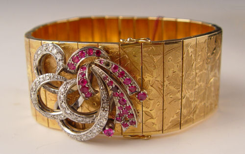 Appraisal: K YELLOW GOLD DIAMOND AND RUBY RETRO BRACELET Ca -