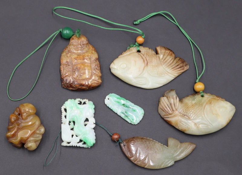 Appraisal: CARVED JADE AND HARDSTONE GROUPING Includes a carved monkey with