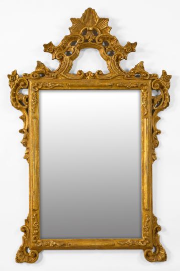 Appraisal: Italian Carved Giltwood Looking Glass in the th-century rococo style