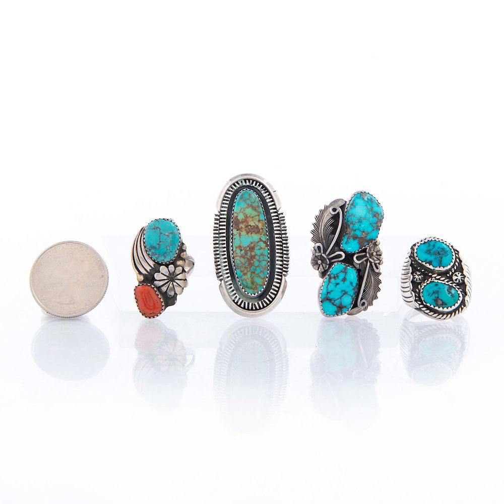 Appraisal: NATIVE AMERICAN TRIBAL SILVER AND TURQUOISE RINGS Turquoise with inclusions