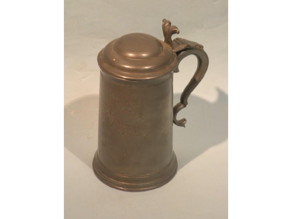 Appraisal: A pewter lidded tankard engraved Queens College Regatta cm highProvenance