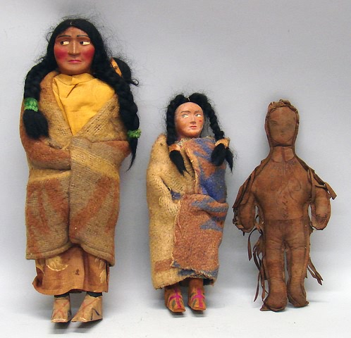 Appraisal: Lot of Native American dolls Pair of Skookum dolls Female