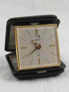 Appraisal: A Jaeger Le Coultre travelling alarm clock in black leather