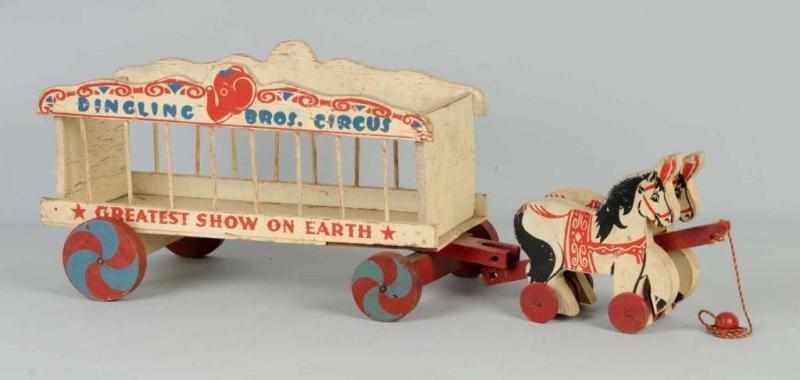 Appraisal: Wooden Horse-Drawn Circus Wagon Toy Description Original ball and pull