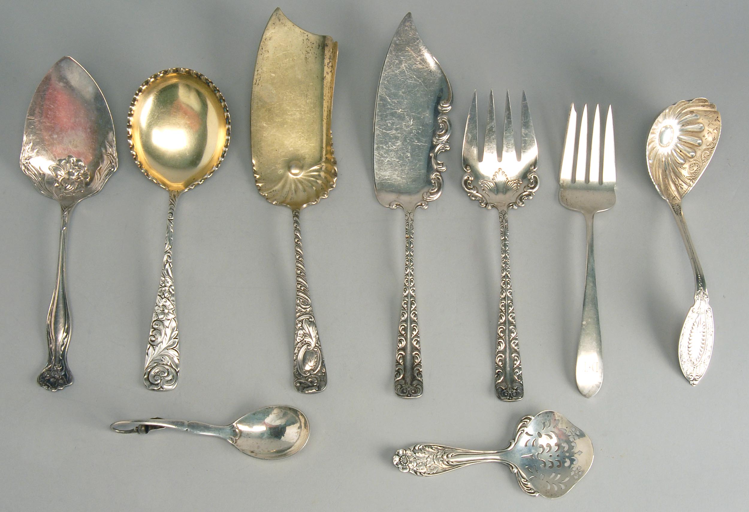 Appraisal: NINE STERLING SILVER AND SILVER PLATED SERVING PIECES Includes a