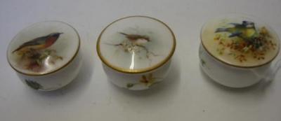 Appraisal: A COLLECTION OF THREE ROYAL WORCESTER RING BOXES of circular