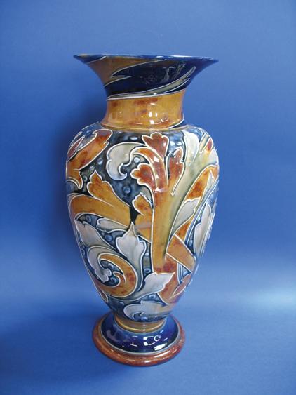 Appraisal: A ROYAL DOULTON STONEWARE VASE of baluster form with tube