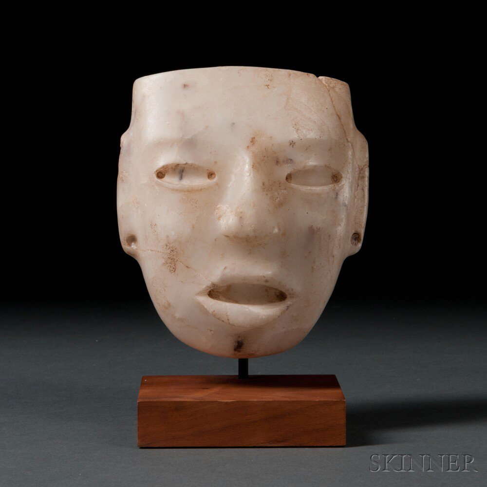 Appraisal: Teotihuacan Carved Stone Mask c - A D with delicately