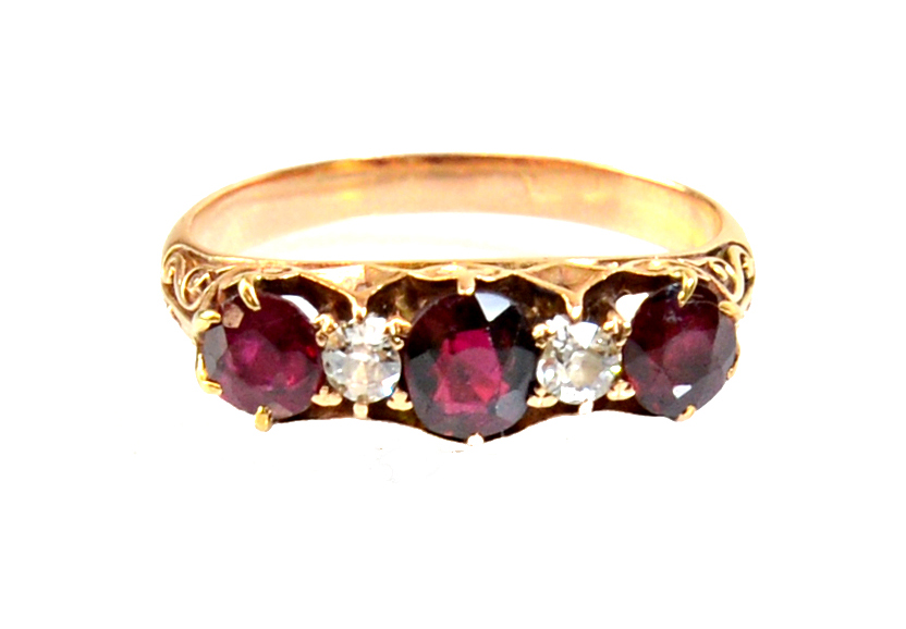 Appraisal: A gold ruby and diamond set five stone ring mounted