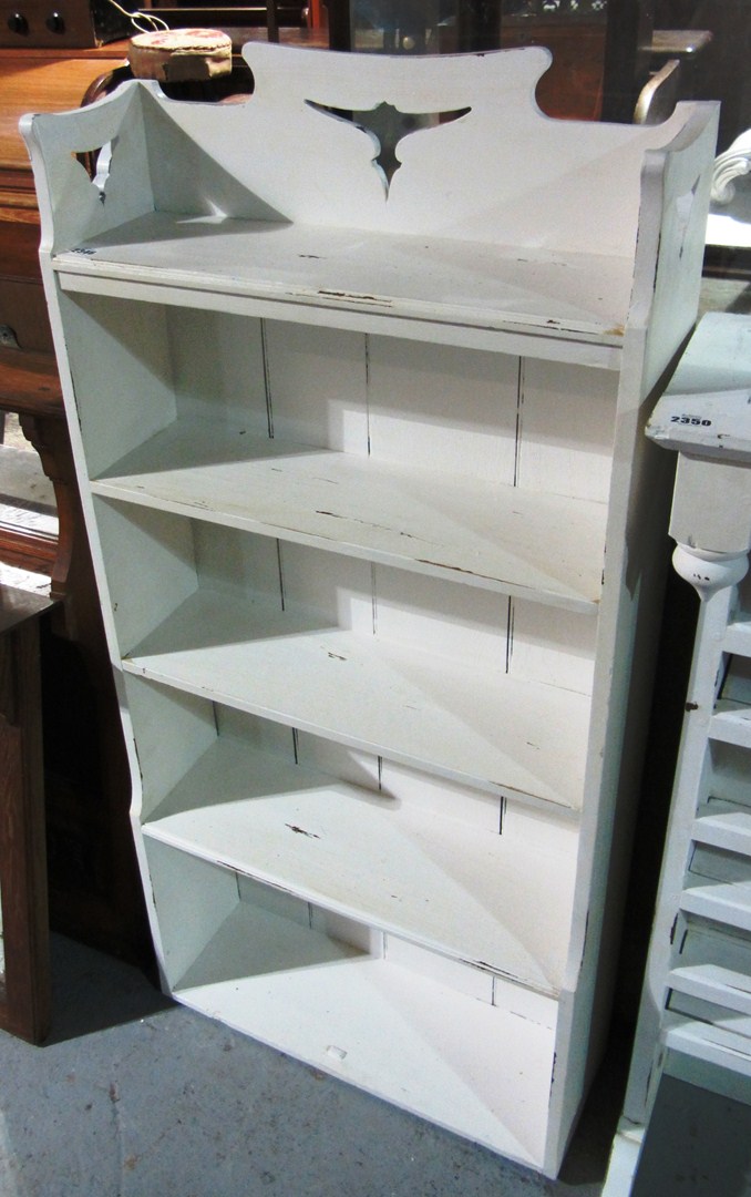 Appraisal: A white painted four tier bookcase