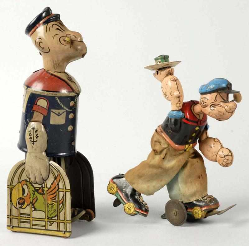 Appraisal: Lot of Vintage Tin Litho Popeye Wind-Up Toys Description Working