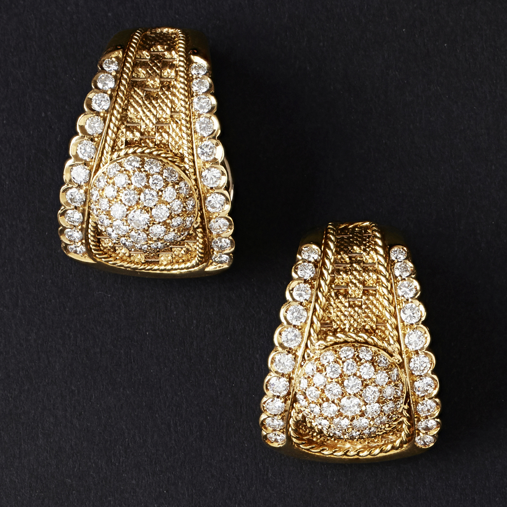 Appraisal: A pair of diamond set ear clipseach of tapering design