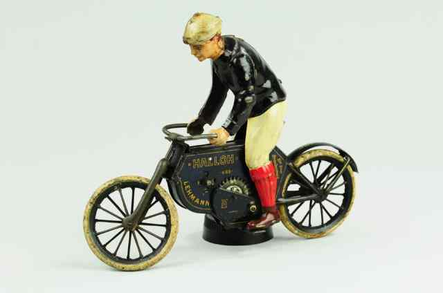 Appraisal: LEHMANN HALLOH RIDER ON CYCLE Germany lithographed tin figure riding