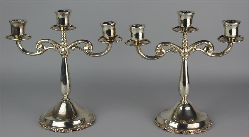 Appraisal: PAIR OF MEXICAN SILVER THREE-LIGHT CANDELABRA mid th Century maker's