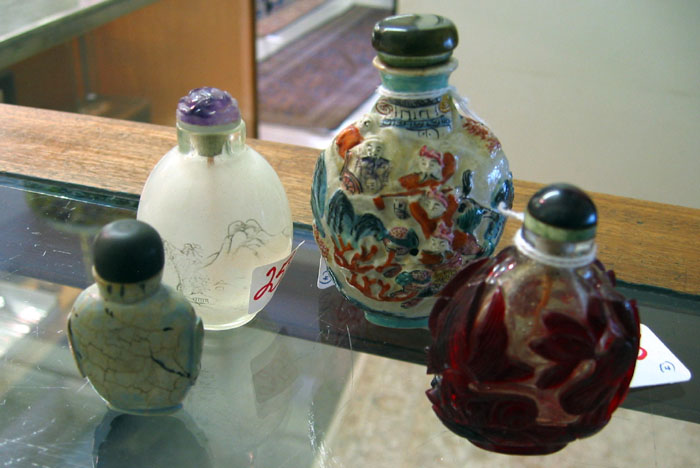 Appraisal: A GROUP OF FOUR CHINESE SNUFF BOTTLES Included a porcelain