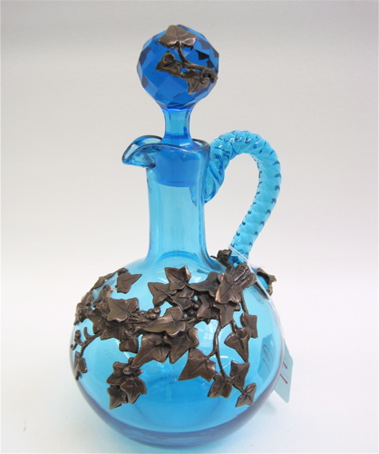 Appraisal: BLUE ART GLASS CRUET WITH BRONZE OVERLAY original stopper having