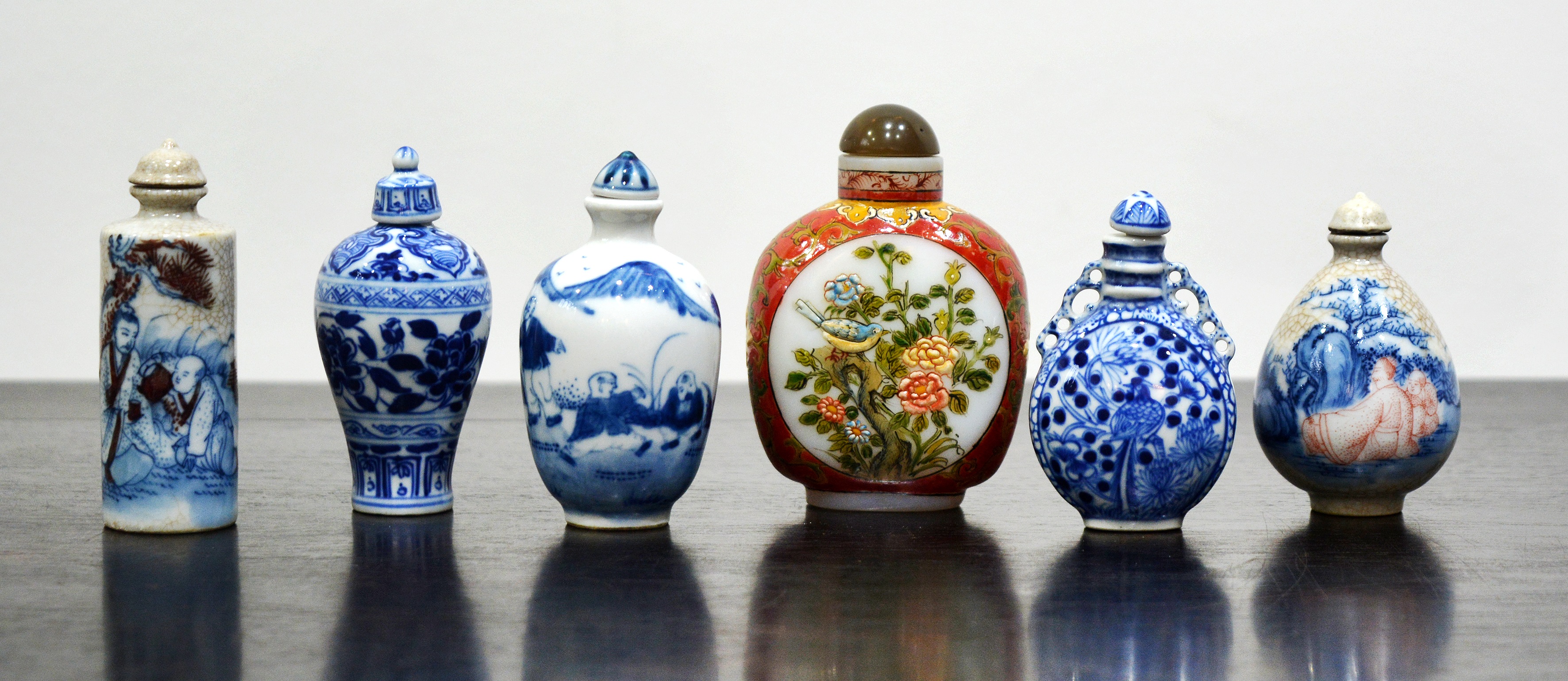 Appraisal: Small group of snuff bottlesChinese th Century to include four