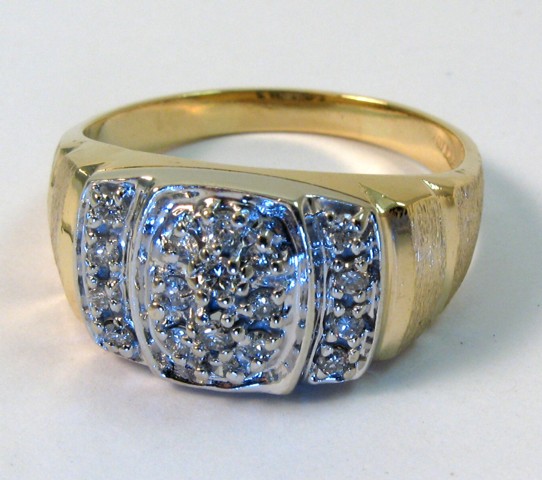 Appraisal: MAN'S DIAMOND AND TEN KARAT GOLD RING set with round-cut