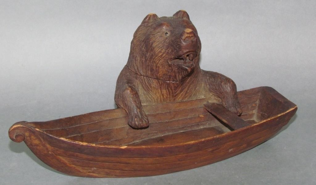 Appraisal: WOODEN CARVED INKWELLbear with a boat h areas of wear