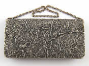 Appraisal: A Russian silver samorodok finish lady's purse with chain handle