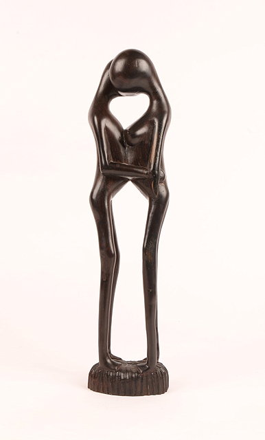 Appraisal: AN EAST AFRICAN MAKONDE WOOD GROUP of lovers signed M