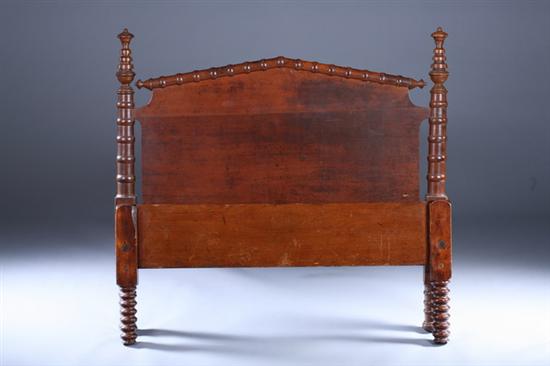 Appraisal: PAIR WALNUT SPOOL-TURNED BED FRAMES th century Urn-topped short posts