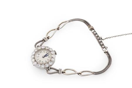 Appraisal: An early th century platinum and diamond set cocktail watch