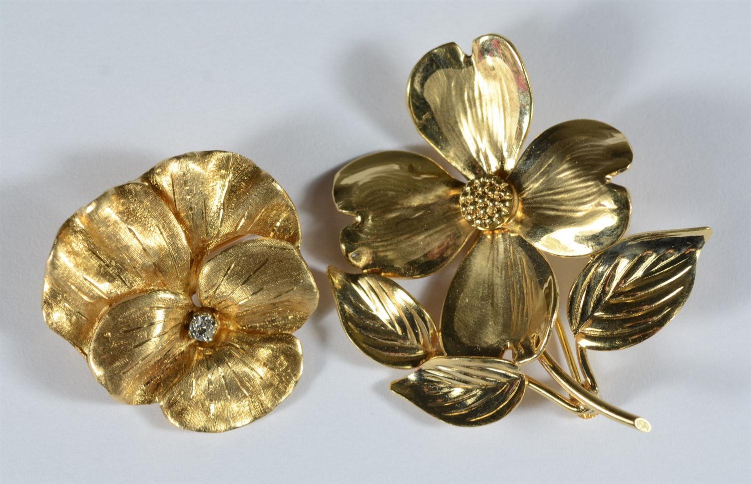 Appraisal: K YG floral pins one set with small diamond dwt