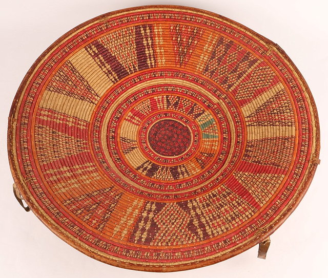 Appraisal: A FINE HARAR ETHIOPIAN CIRCA BASKET with radiating polychrome decoration