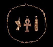 Appraisal: A Lot of Egyptian Gold Lot includes three pendants and