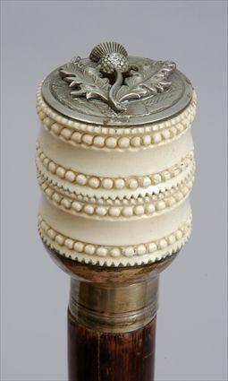 Appraisal: IVORY-HANDLED WALKING STICK The double ring twist-off handle by pewter