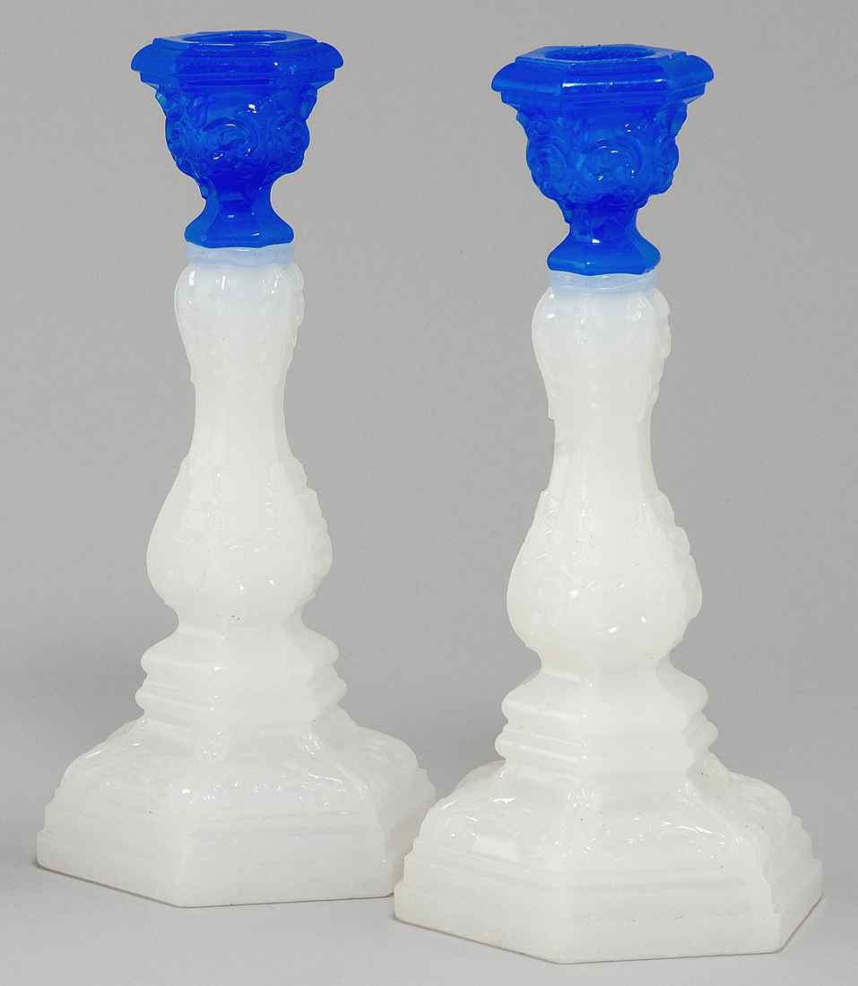 Appraisal: PAIR OF SANDWICH GLASS CANDLESTICKS Circa In acanthus leaf pattern