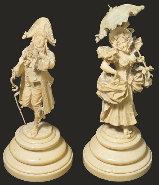 Appraisal: A pair of French carved ivory figures late th early