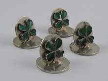 Appraisal: A set of four silver green enamelled four leaved clover