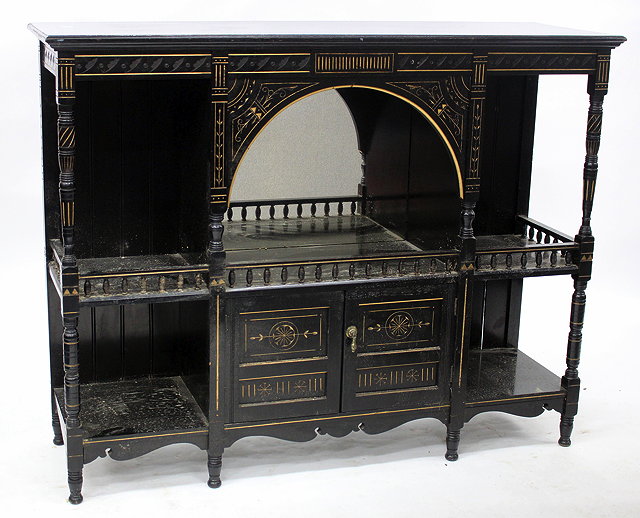 Appraisal: A VICTORIAN AESTHETIC MOVEMENT EBONY SIDEBOARD with turned supports cm