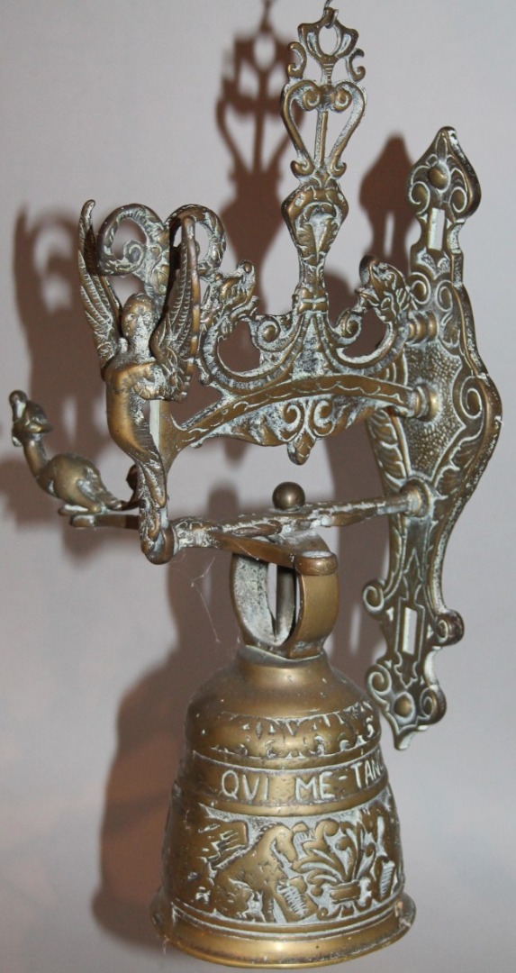 Appraisal: A brass door bell of typical outline entitled QUI ME-TANGIT