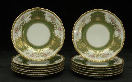 Appraisal: Set of Twelve Limoges Gilt and Polychrome Decorated Porcelain Plates