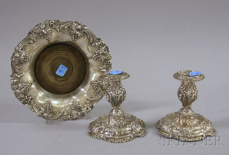 Appraisal: Pair of English Sterling Weighted Candlesticks and a Silver Plated