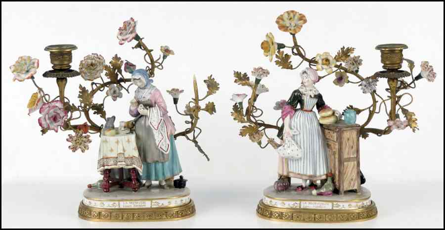 Appraisal: PAIR OF FRENCH GILT AND PAINTED PORCELAIN FIGURES Fitted into