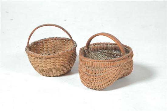 Appraisal: TWO BASKETS American early th century woven splint Round gathering