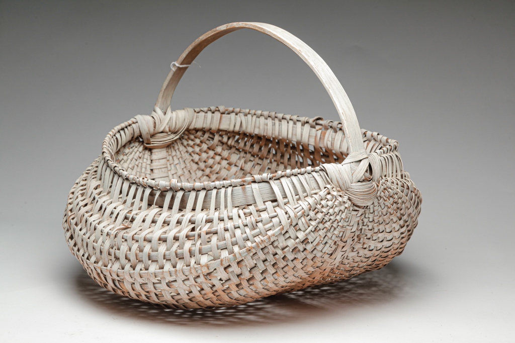 Appraisal: AMERICAN PAINTED BUTTOCKS BASKET Early th century Woven splint and