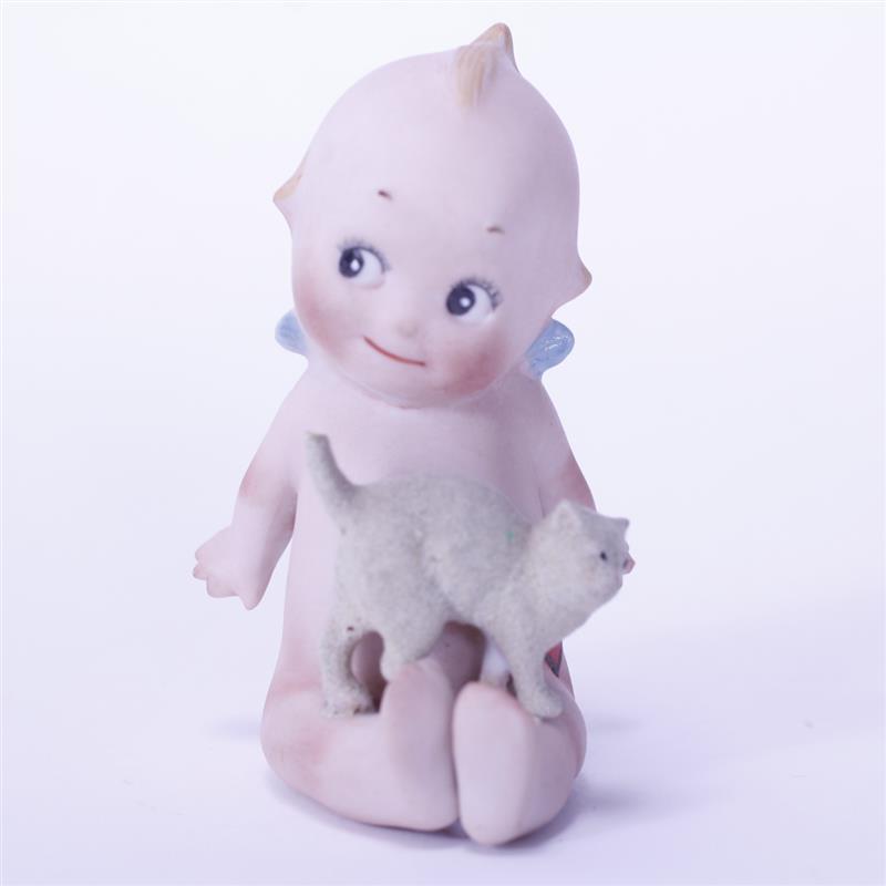 Appraisal: Rose O'Neill German Bisque Action Kewpie Doll seated with kitten