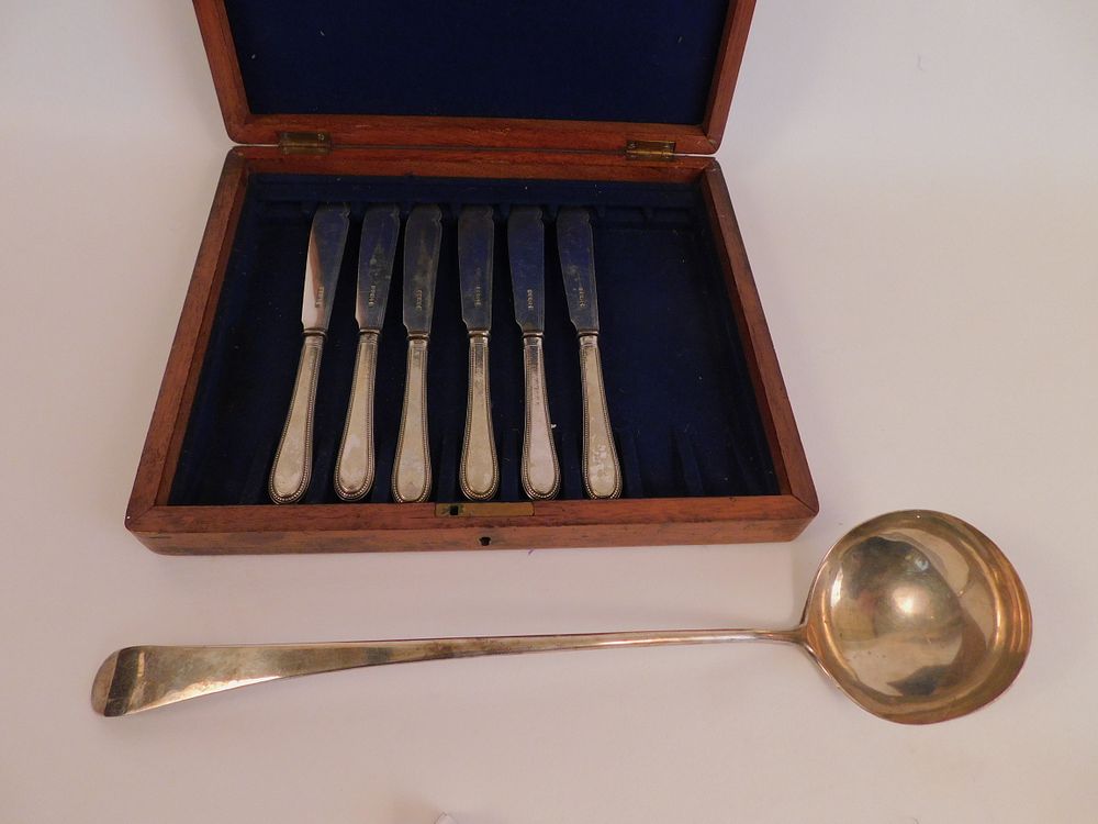 Appraisal: CASED SILVER FISH KNIVES COIN LADLE Set antique English sterling