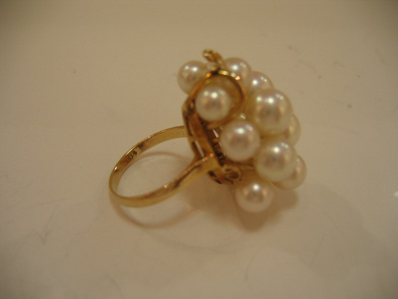 Appraisal: PEARL RING AND EARRINGS Yellow gold cluster ring set with