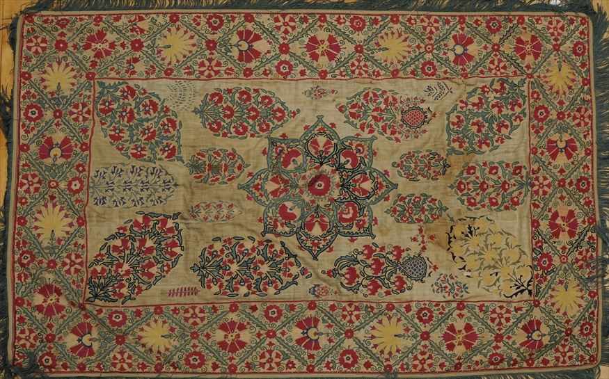 Appraisal: SUZANI EMBROIDERED WALL HANGING Woven with a central medallion with