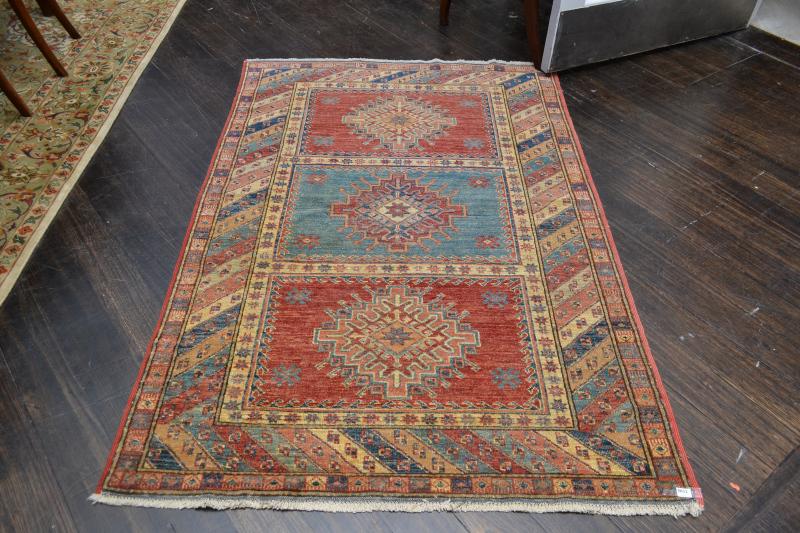 Appraisal: A MEDIUM SIZE PERSIAN RUG IN DEEP ORANGE TEAL AND