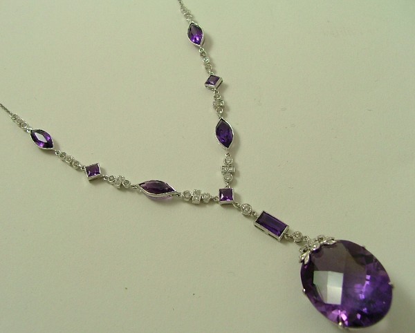 Appraisal: AMETHYST AND DIAMOND PENDANT NECKLACE K white gold and set