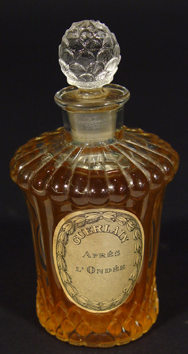 Appraisal: Baccarat Guerlain Apres L-Ondee ribbed glass scent bottle and pineapple-shaped