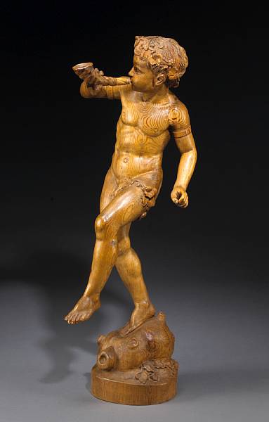 Appraisal: A Continental pine figure of a young satyr th century