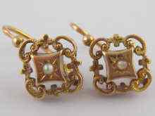 Appraisal: A pair of French hallmarked carat gold earrings drop approx